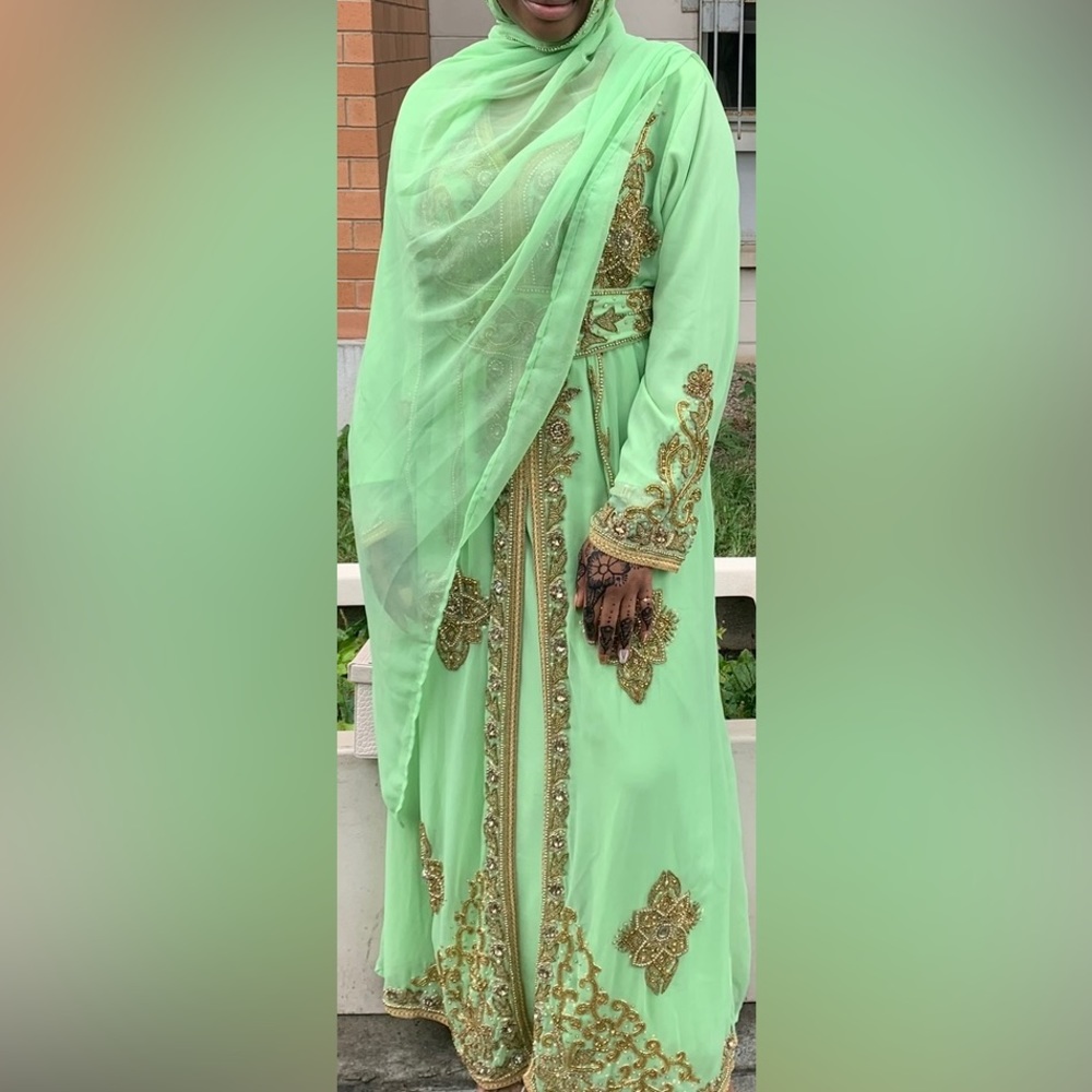 Green dress with gold rhinestones